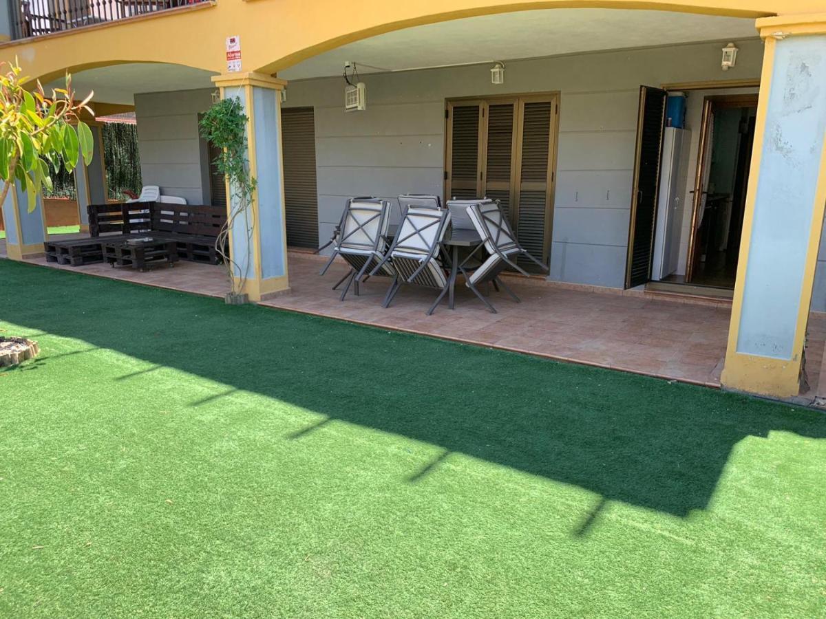 Apartamento con jardín privado y acceso a piscina Huelva Exterior foto